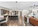 Spacious living area with hardwood floors, kitchen bar and staircase at 311 12Th N Ave, St Petersburg, FL 33701