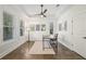 Bright home office with hardwood floors, modern desk, and natural light from windows at 311 12Th N Ave, St Petersburg, FL 33701