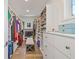 Well-organized walk-in closet with custom shelving, drawers, and ample hanging space at 311 12Th N Ave, St Petersburg, FL 33701