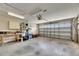 Spacious garage with ample storage space and an automatic door opener at 318 Lookout Dr, Apollo Beach, FL 33572