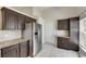 Kitchen features stainless steel appliances, granite countertops, tile backsplash, and lots of cabinet space at 318 Lookout Dr, Apollo Beach, FL 33572