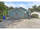 Attractive home with stone accents, a driveway, and a well-maintained yard at 3201 36Th N Ave, St Petersburg, FL 33713