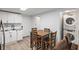 Kitchen features stacked washer/dryer and breakfast bar with seating at 3201 36Th N Ave, St Petersburg, FL 33713