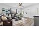 Inviting living room with modern furniture, hardwood floors, and ample natural light at 3201 36Th N Ave, St Petersburg, FL 33713