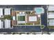 Aerial view of the community including the pool, shuffle board, and clubhouse at 3301 Alt 19 # 317, Palm Harbor, FL 34683