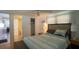 Bedroom with a desk and sliding door closet, and ceiling fan at 3301 Alt 19 # 317, Palm Harbor, FL 34683