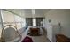 Cozy bedroom featuring a bed, an electric fireplace, and neutral decor at 3301 Alt 19 # 317, Palm Harbor, FL 34683