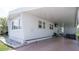 Spacious covered carport with ample parking, providing shelter and convenience for residents and guests at 3301 Alt 19 # 317, Palm Harbor, FL 34683