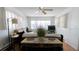 Comfortable living room with plenty of light from surrounding windows at 3301 Alt 19 # 317, Palm Harbor, FL 34683