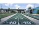 Shuffleboard courts with shaded benches are available for residents and guests at 3301 Alt 19 # 317, Palm Harbor, FL 34683