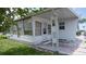 Bright sunroom with ample natural light, perfect for relaxing or enjoying views of the surrounding landscape at 3301 Alt 19 # 317, Palm Harbor, FL 34683
