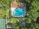 Aerial view of a community pool, playground, and picnic area at 344 Cascade Ln, Palm Harbor, FL 34684