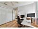 Bright office space with multiple work areas, neutral walls, and storage at 344 Cascade Ln, Palm Harbor, FL 34684
