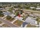 Real estate aerial view of home, paved driveway, fenced yard, convenient location at 3490 57Th St, St Petersburg, FL 33710