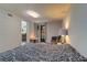 Spacious bedroom featuring a sitting area, wood-look floors, and natural light at 3910 14Th N Ave, St Petersburg, FL 33713