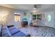 Living room featuring neutral paint, wood-look floors, and stylish decor at 3910 14Th N Ave, St Petersburg, FL 33713