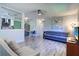 Open living space flowing into a modern kitchen with stainless steel appliances at 3910 14Th N Ave, St Petersburg, FL 33713