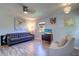 Bright living room with neutral walls, wood-look floors, and comfortable furniture at 3910 14Th N Ave, St Petersburg, FL 33713