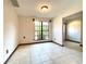 Bright dining area with large windows and tile flooring at 4006 Huxford Ct, Tampa, FL 33624
