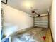 Functional garage space ready for storage or parking with an automatic garage door at 4006 Huxford Ct, Tampa, FL 33624