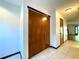 Bright tiled hallway with closet and view of rear yard at 4006 Huxford Ct, Tampa, FL 33624