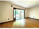 Spacious living room with natural light and sliding glass doors that lead to the outdoors at 4006 Huxford Ct, Tampa, FL 33624