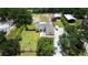 Expansive backyard includes outbuildings at 408 River Bed Ct, Wimauma, FL 33598