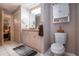 Cozy bathroom with ample storage, vanity, and tiled floor provides a comfortable setting at 408 River Bed Ct, Wimauma, FL 33598