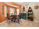 Bright dining area with stylish furniture and decor at 408 River Bed Ct, Wimauma, FL 33598