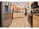 Spacious kitchen featuring stainless appliances and neutral cabinets at 408 River Bed Ct, Wimauma, FL 33598