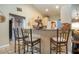 Kitchen with breakfast bar seating at 408 River Bed Ct, Wimauma, FL 33598