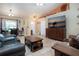 Open-concept living room with tile flooring and access to multiple rooms at 408 River Bed Ct, Wimauma, FL 33598