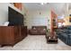 Spacious living room with tile floors and bright natural light at 408 River Bed Ct, Wimauma, FL 33598