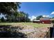 A beautiful property showcasing horses, a barn, and a spacious field, ideal for equestrian enthusiasts at 408 River Bed Ct, Wimauma, FL 33598