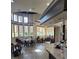 Cafe area offering tables, chairs, and countertop service, perfect for relaxed socializing at 4116 Knollpoint Dr, Wesley Chapel, FL 33544