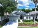 Charming two-story home with well-maintained landscaping and attached two car garage at 4116 Knollpoint Dr, Wesley Chapel, FL 33544