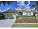 Beautiful one story home with a two car garage and tasteful landscaping at 4116 Knollpoint Dr, Wesley Chapel, FL 33544