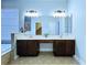Main bathroom featuring double sinks and vanity at 4116 Knollpoint Dr, Wesley Chapel, FL 33544