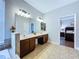 Main bathroom featuring double sinks and vanity at 4116 Knollpoint Dr, Wesley Chapel, FL 33544