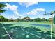 Enjoy a game of basketball on this fenced-in community court at 4901 Windingbrook Trl, Wesley Chapel, FL 33544