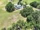 Gorgeous home surrounded by a large yard with trees, perfect for nature lovers at 5007 Booth Rd, Plant City, FL 33565