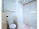 Clean, neutral-toned half bath with a modern toilet and shiplap wall at 5007 Booth Rd, Plant City, FL 33565