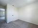 Cozy bedroom with neutral carpet and ample natural light at 5007 Booth Rd, Plant City, FL 33565