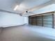 Spacious garage with painted floor and automatic door, ready for your vehicles and storage needs at 5007 Booth Rd, Plant City, FL 33565
