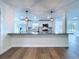 Eat-in kitchen with stainless steel appliances, granite countertops and sleek design, perfect for culinary enthusiasts at 5007 Booth Rd, Plant City, FL 33565