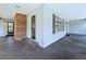 Covered outdoor patio featuring brick accents and providing a cozy space for relaxation and entertaining at 5007 Booth Rd, Plant City, FL 33565