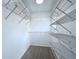 Walk-in closet with adjustable wire shelving for optimal storage and organization at 5007 Booth Rd, Plant City, FL 33565