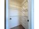 Walk-in closet with adjustable wire shelving for optimal storage and organization at 5007 Booth Rd, Plant City, FL 33565