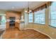 Bright kitchen features stainless steel appliances, ample cabinetry, and a cozy breakfast nook with natural light at 5315 Cedarshake Ln, Valrico, FL 33596