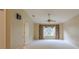 Cozy main bedroom with a large window provides ample natural light and a peaceful retreat at 5315 Cedarshake Ln, Valrico, FL 33596
